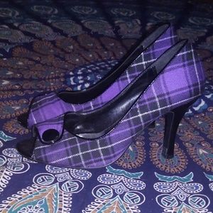 Purple tarten heels with accent button